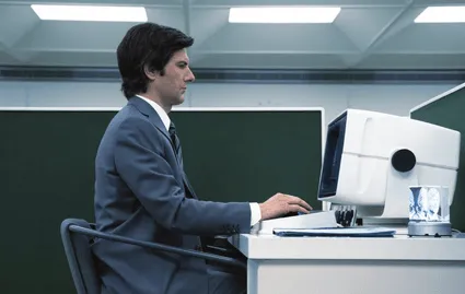 a man on his computer